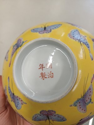 Lot 96 - A Chinese famille-rose yellow-ground 'butterfly' bowl, Qing dynasty, Tongzhi mark and period