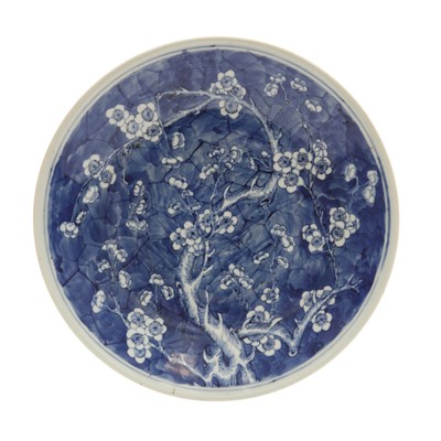 Lot 323 - A Chinese blue and white 'prunus' dish, Qing dynasty, 19th century