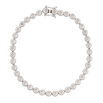 Lot 307 - A diamond line bracelet