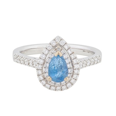 Lot 71 - An aquamarine and diamond halo ring, circa 2018