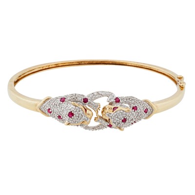Lot 158 - A ruby and diamond panther bangle
