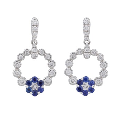 Lot 25 - A pair of sapphire and diamond pendent earrings