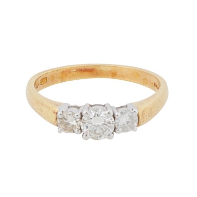 Lot 275 - A three-stone diamond ring, circa 2005