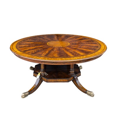 Lot 33 - A Regency style mahogany 'Jupe' action extending circular dining table, Contemporary