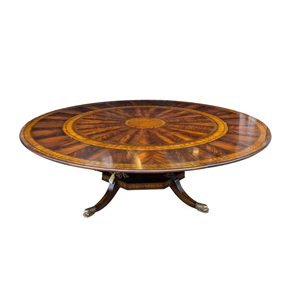 Lot 33 - A Regency style mahogany 'Jupe' action extending circular dining table, Contemporary