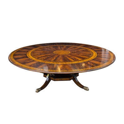 Lot 33 - A Regency style mahogany 'Jupe' action extending circular dining table, Contemporary