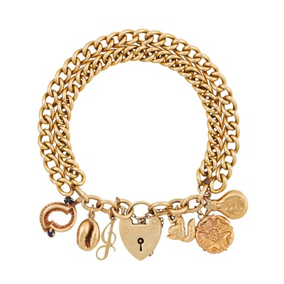Lot 388 - A heart lock charm bracelet