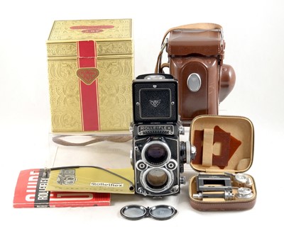 Lot 228 - Metered Rolleiflex 2.8F TLR Camera, Boxed with Extras.