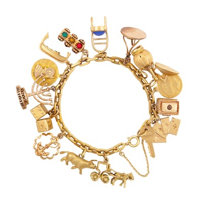 Lot 406 - A charm bracelet