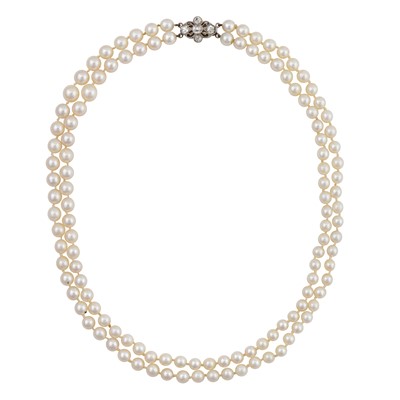 Lot 272 - A double strand pearl and diamond necklace
