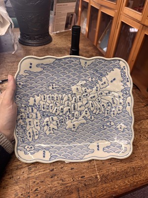 Lot 65 - A Japanese Arita blue and white 'map' dish, Edo period, circa 1830-1843