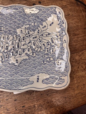 Lot 65 - A Japanese Arita blue and white 'map' dish, Edo period, circa 1830-1843