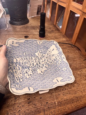Lot 65 - A Japanese Arita blue and white 'map' dish, Edo period, circa 1830-1843