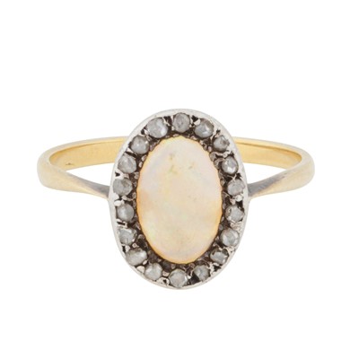 Lot 328 - An opal and diamond halo ring
