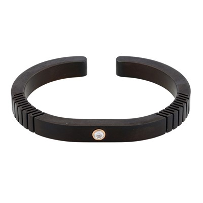 Lot 369 - Alan Tam | A black titanium and diamond bangle