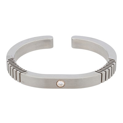 Lot 248 - Alan Tam | A titanium and diamond bangle