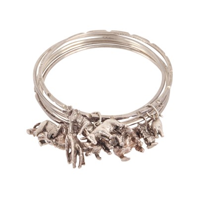 Lot 250 - Five animal charm bangles