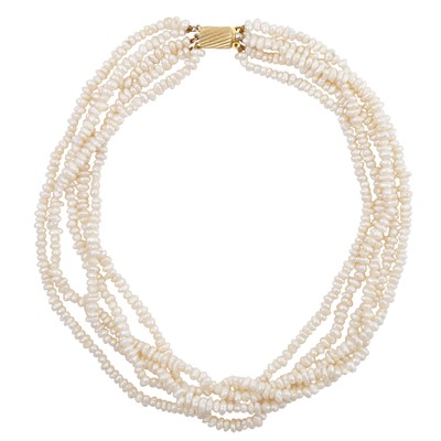 Lot 33 - A multi strand rice pearl necklace