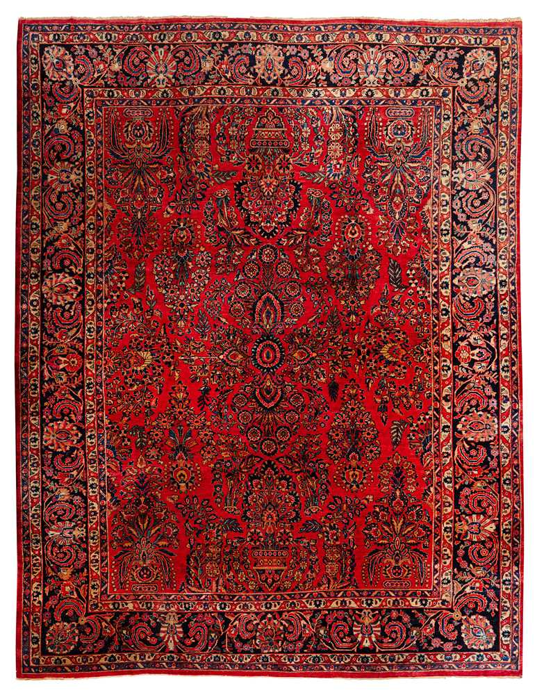 Lot 65 - An antique Sarouk carpet, west Persia