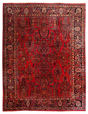 Lot 65 - An antique Sarouk carpet, west Persia