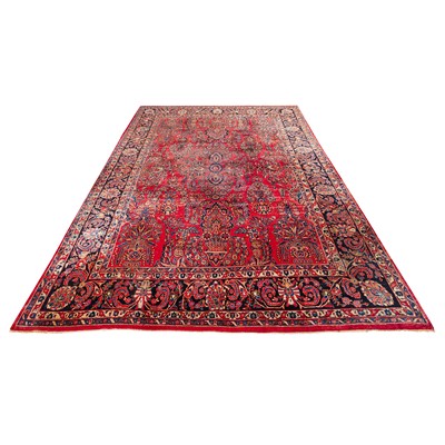 Lot 65 - An antique Sarouk carpet, west Persia