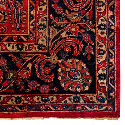 Lot 65 - An antique Sarouk carpet, west Persia