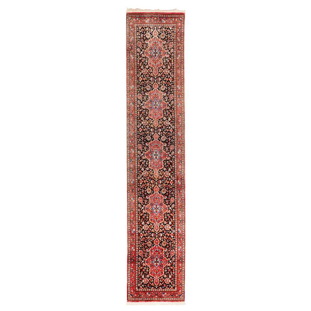 Lot 101 - An extremely fine silk Qum runner, central Persia