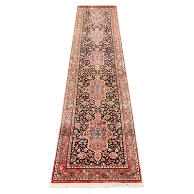 Lot 101 - An extremely fine silk Qum runner, central Persia