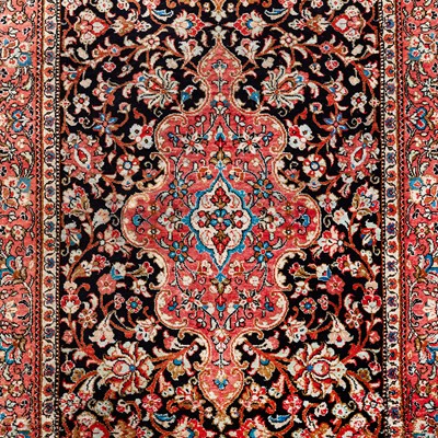 Lot 101 - An extremely fine silk Qum runner, central Persia