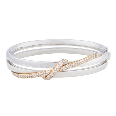 Lot 238 - Mappin & Webb Ι A gold and diamond bangle, circa 2007