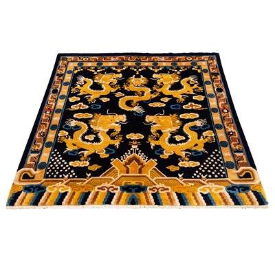 Lot 21 - An unusual fine Chinese carpet