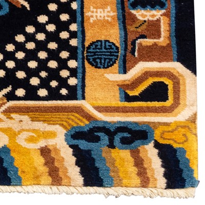 Lot 21 - An unusual fine Chinese carpet