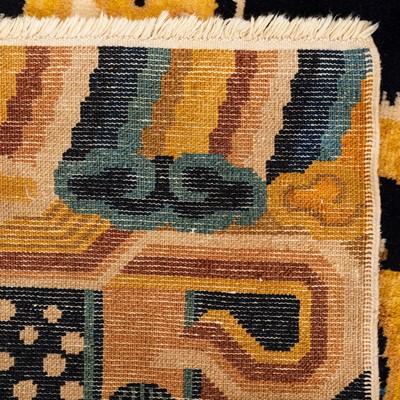 Lot 21 - An unusual fine Chinese carpet