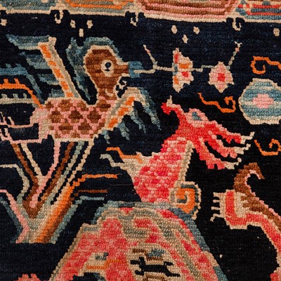 Lot 22 - An antique Tibetan rug