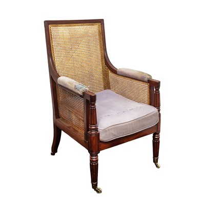 Lot 16 - A Regency mahogany bergère armchair in the manner of Gillows