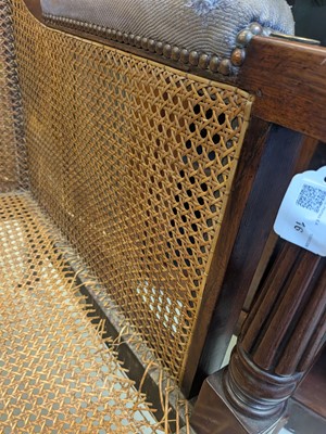 Lot 16 - A Regency mahogany bergère armchair in the manner of Gillows