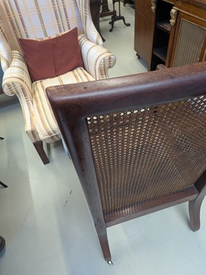 Lot 16 - A Regency mahogany bergère armchair in the manner of Gillows