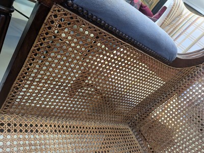 Lot 16 - A Regency mahogany bergère armchair in the manner of Gillows