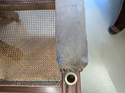 Lot 16 - A Regency mahogany bergère armchair in the manner of Gillows