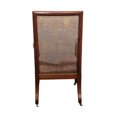 Lot 16 - A Regency mahogany bergère armchair in the manner of Gillows