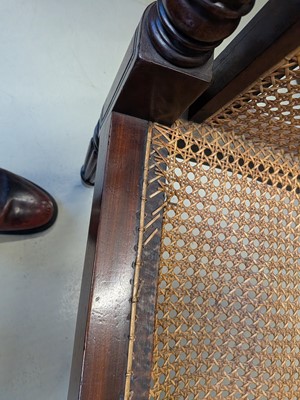 Lot 16 - A Regency mahogany bergère armchair in the manner of Gillows