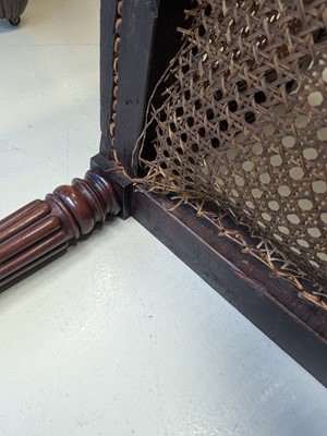 Lot 16 - A Regency mahogany bergère armchair in the manner of Gillows