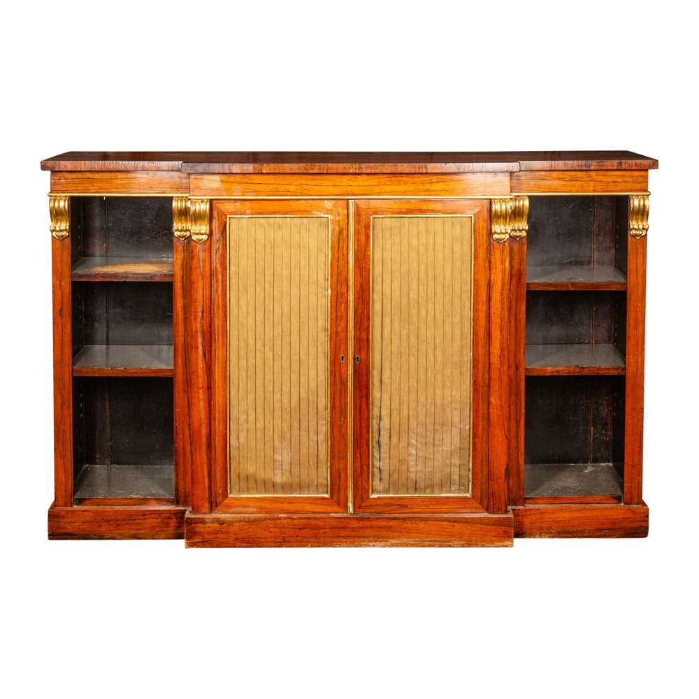 Lot 4 - A Regency rosewood and parcel gilt breakfront open bookcase in the manner of Gillows
