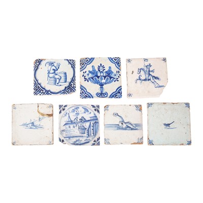 Lot 319 - A group of seven Dutch delftware blue & white tiles, 18th / early 19th century