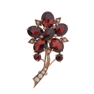 Lot 37 - A garnet and seed pearl flower brooch