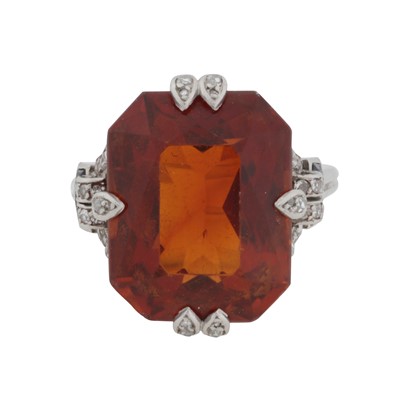 Lot 333 - A citrine, sapphire, and diamond ring