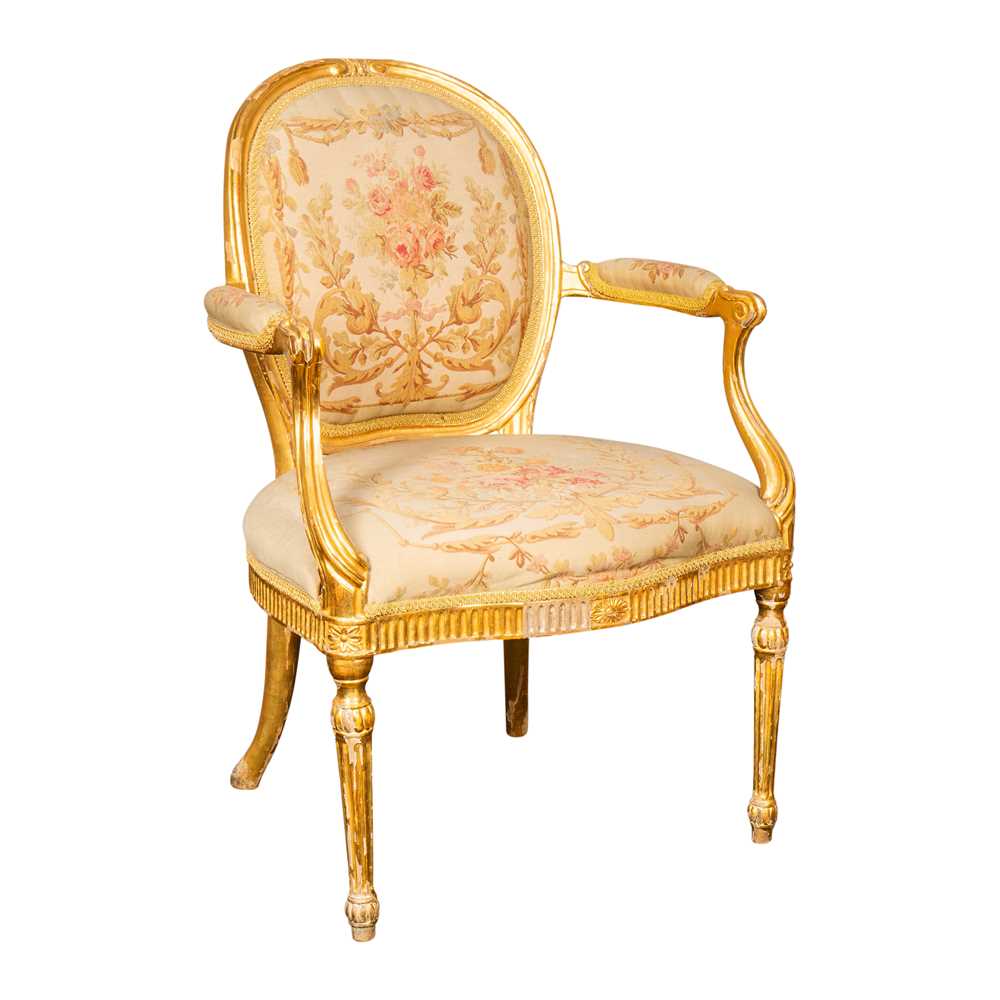 Lot 15 - A George III Louis XVI style gilt gesso on beech fauteuil armchair