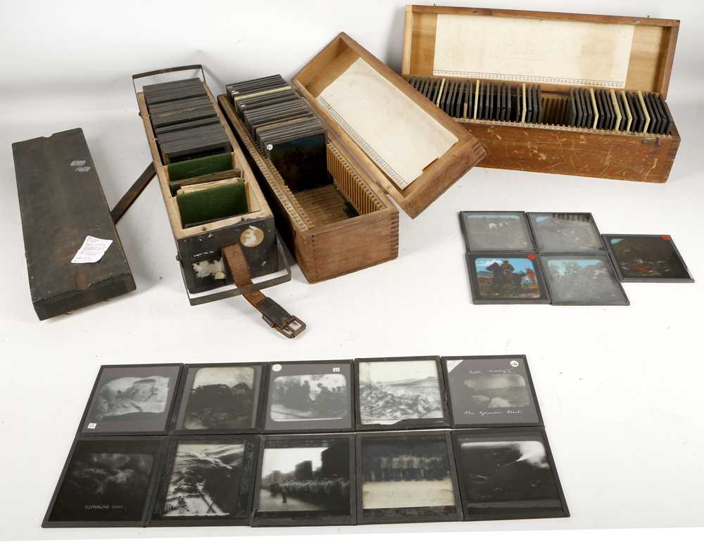 Lot 517 - A section of glass magic lantern slides for...