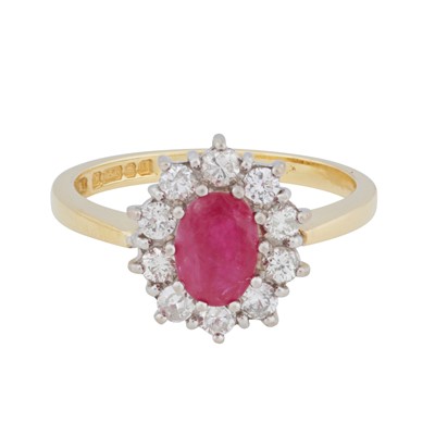 Lot 162 - A ruby and diamond cluster ring, circa 1990