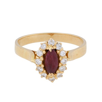 Lot 45 - A ruby and diamond halo ring